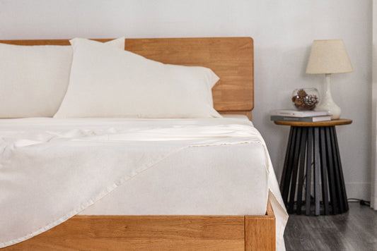 Soft_Washed_Sheet_Set-white-color. sheets are laying on a queen size mattress with pillows