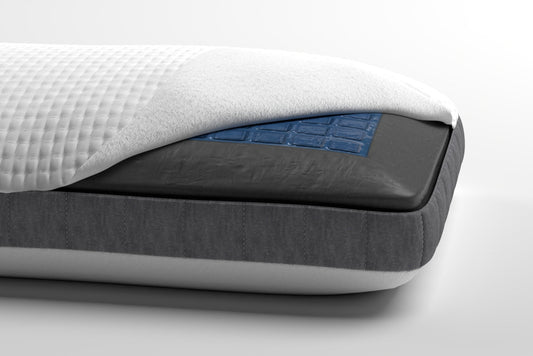 Close-up view of Two-Sided-bamboo-charcoal-Pillow with cool gel slab on one side, and plain charcoal infused memory foam on the other side. Cover is pulled back to expose the memory foam