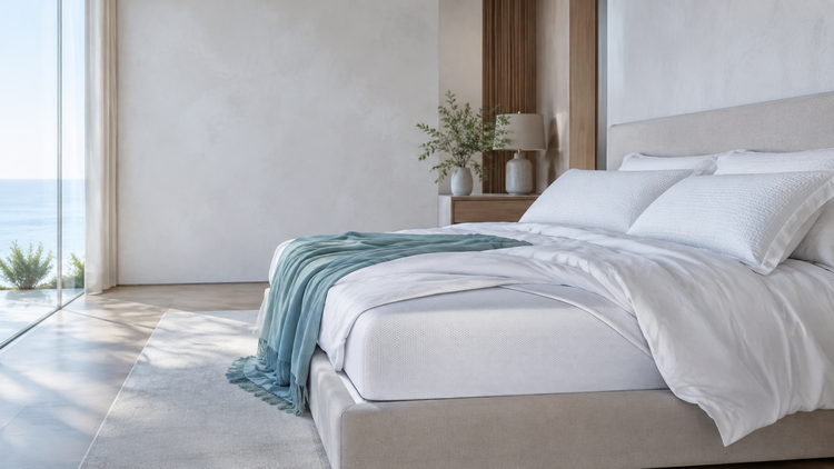Bedroom set with floor to ceiling windows. Low profile bed frame with mattress, pillows and sheets.