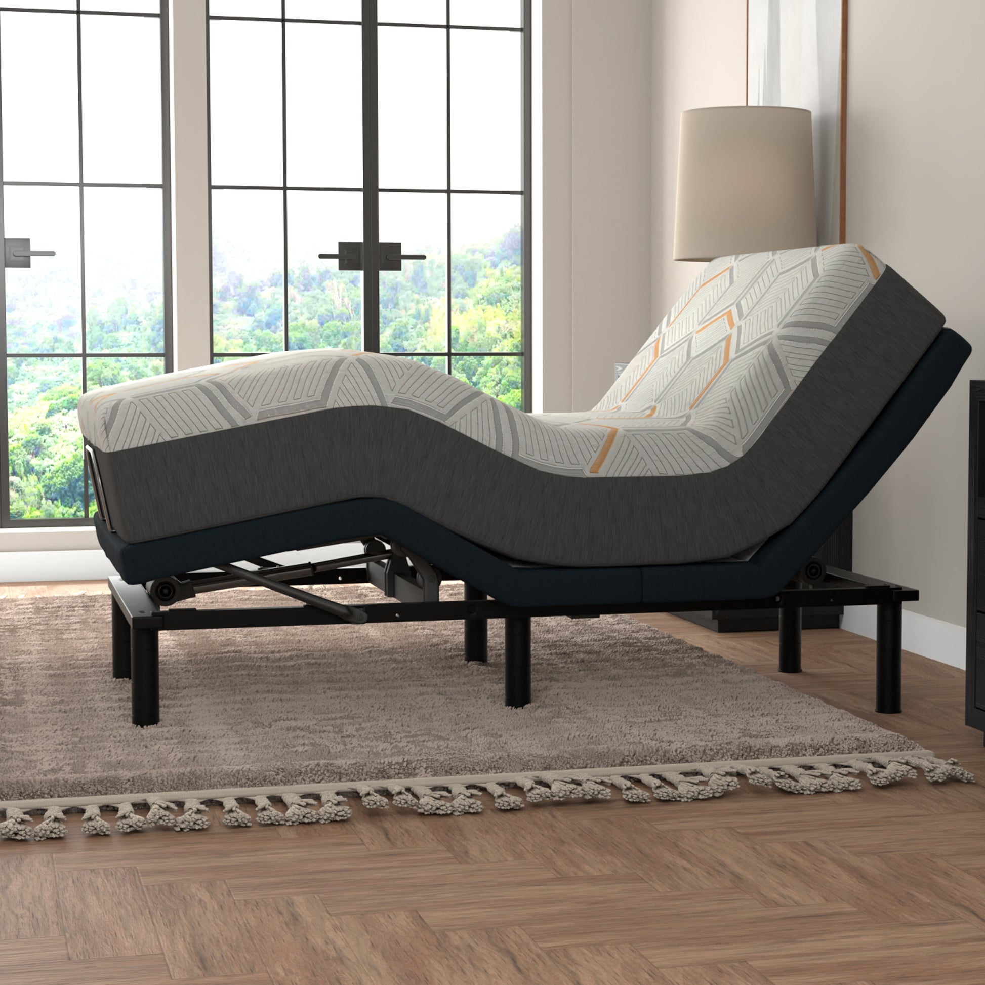 12 inch Copper Mattress on an Adjustable bed in a room with large windows and a lamp.