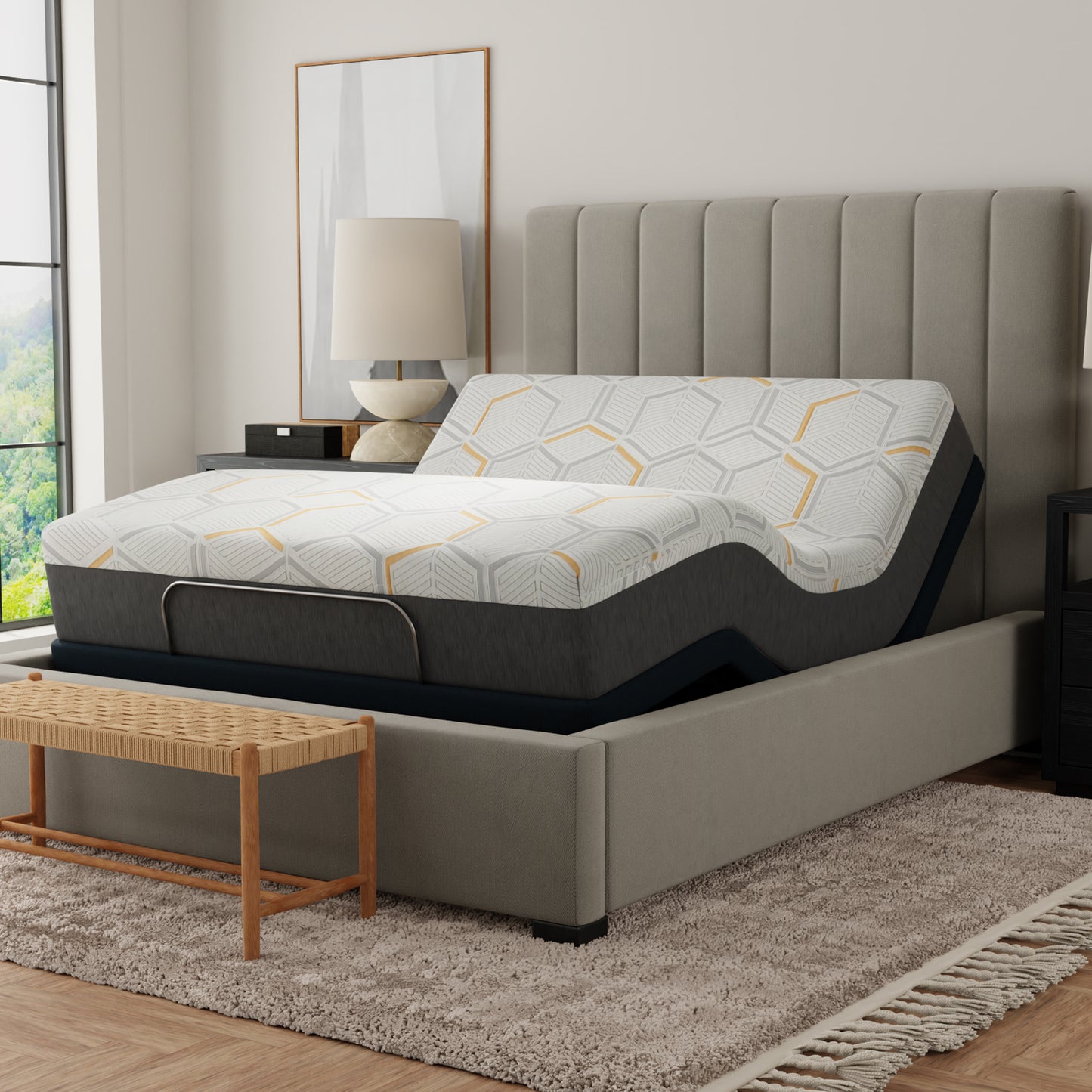 Gray upholstered bed with geometric-patterned mattress in a bedroom setting. 12 inch queen size copper mattress