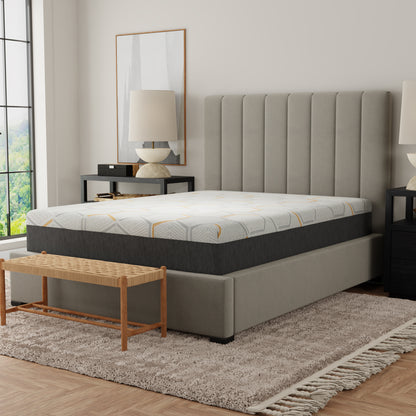 Gray upholstered bed with white mattress in a bedroom setting. Queen size copper mattress