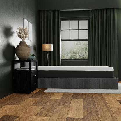 12 inch soft memory foam mattress in modern bedroom. Mattress is white on top with black and gray sides. upholstered bed. Queen size