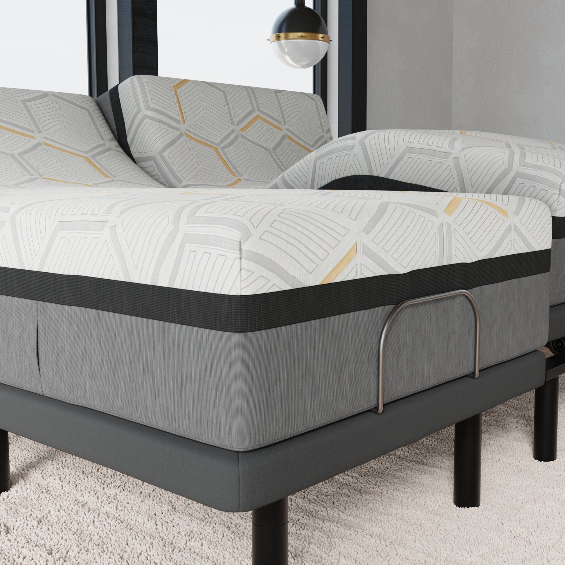 Gray mattress with geometric pattern on an adjustable bed frame in a room setting. Split King bed and mattress