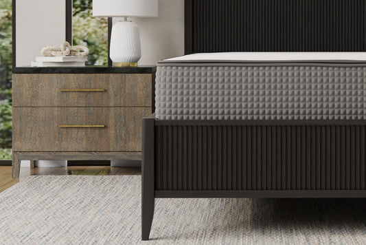 AdaptSleep 12 inch 2-sided mattress. Flippable mattress- firm and soft sides. Modern bedroom with a bed, nightstand, and lamp.