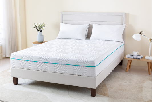White 10 inch foam Mattress on a bed in a bedroom setting