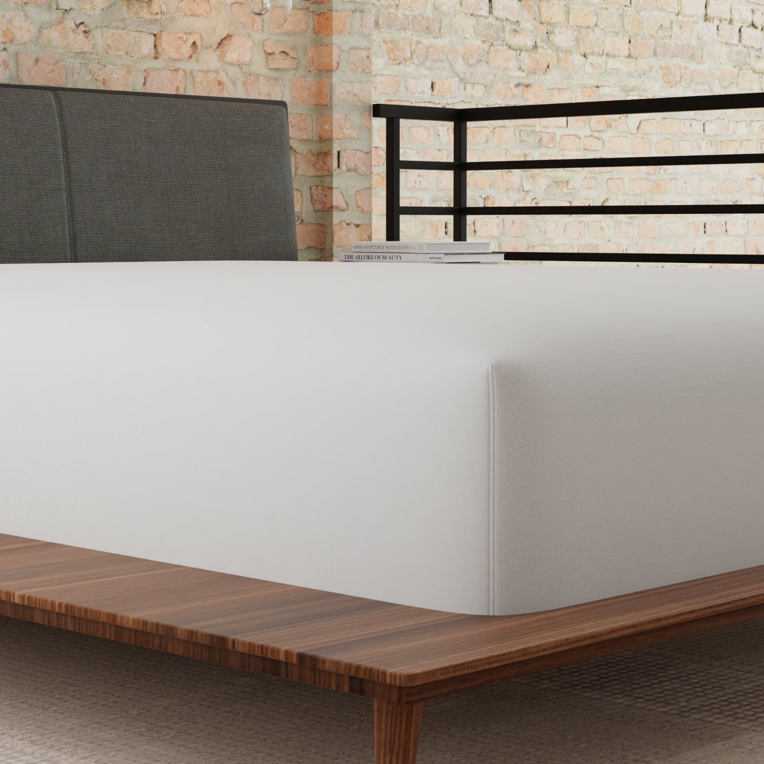 Bed with wooden headboard and gray upholstered headboard against a stone wall. mattress is covered with Mattress protector called Essentials. queen size