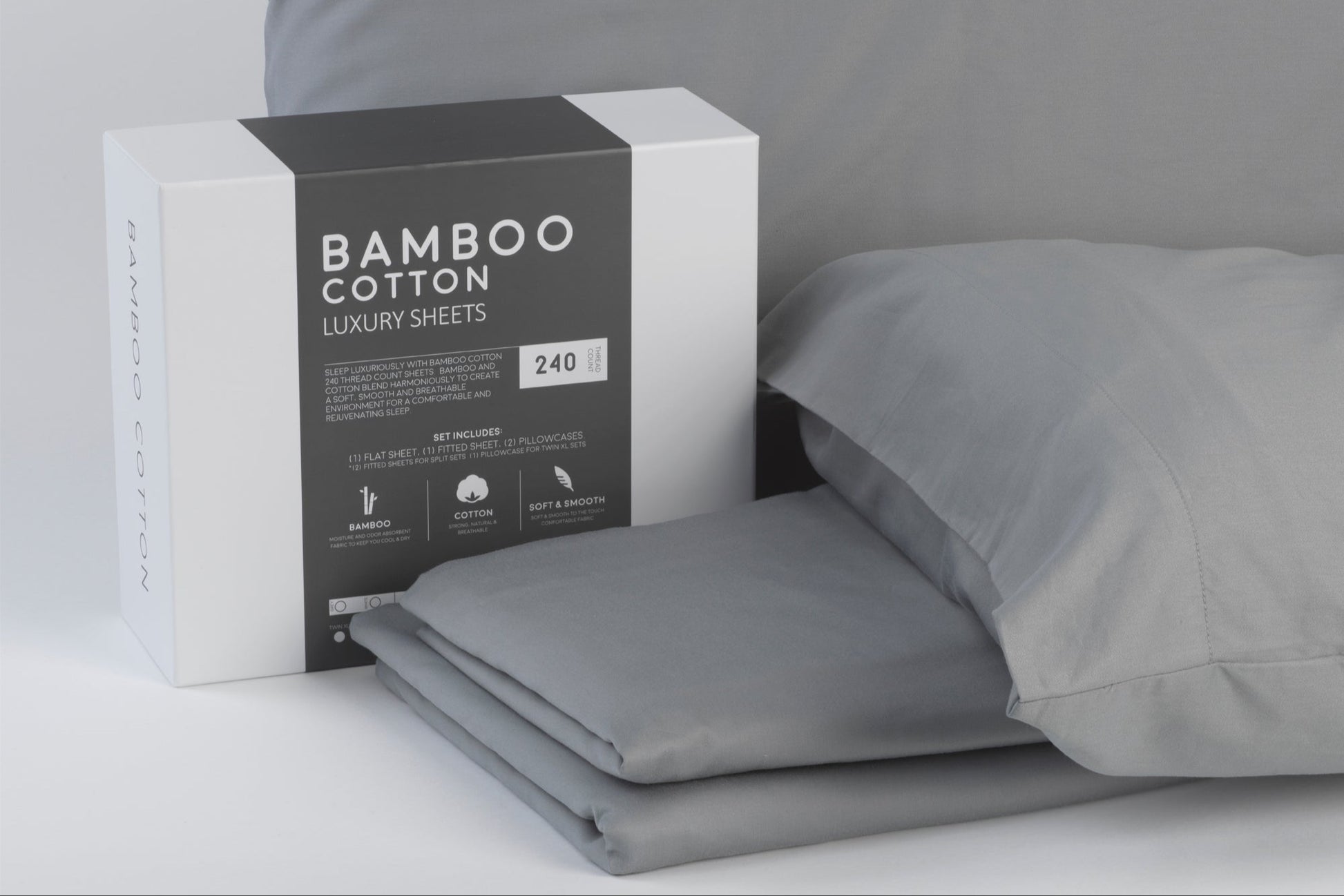 Gray bamboo cotton luxury sheets with packaging on a light gray background