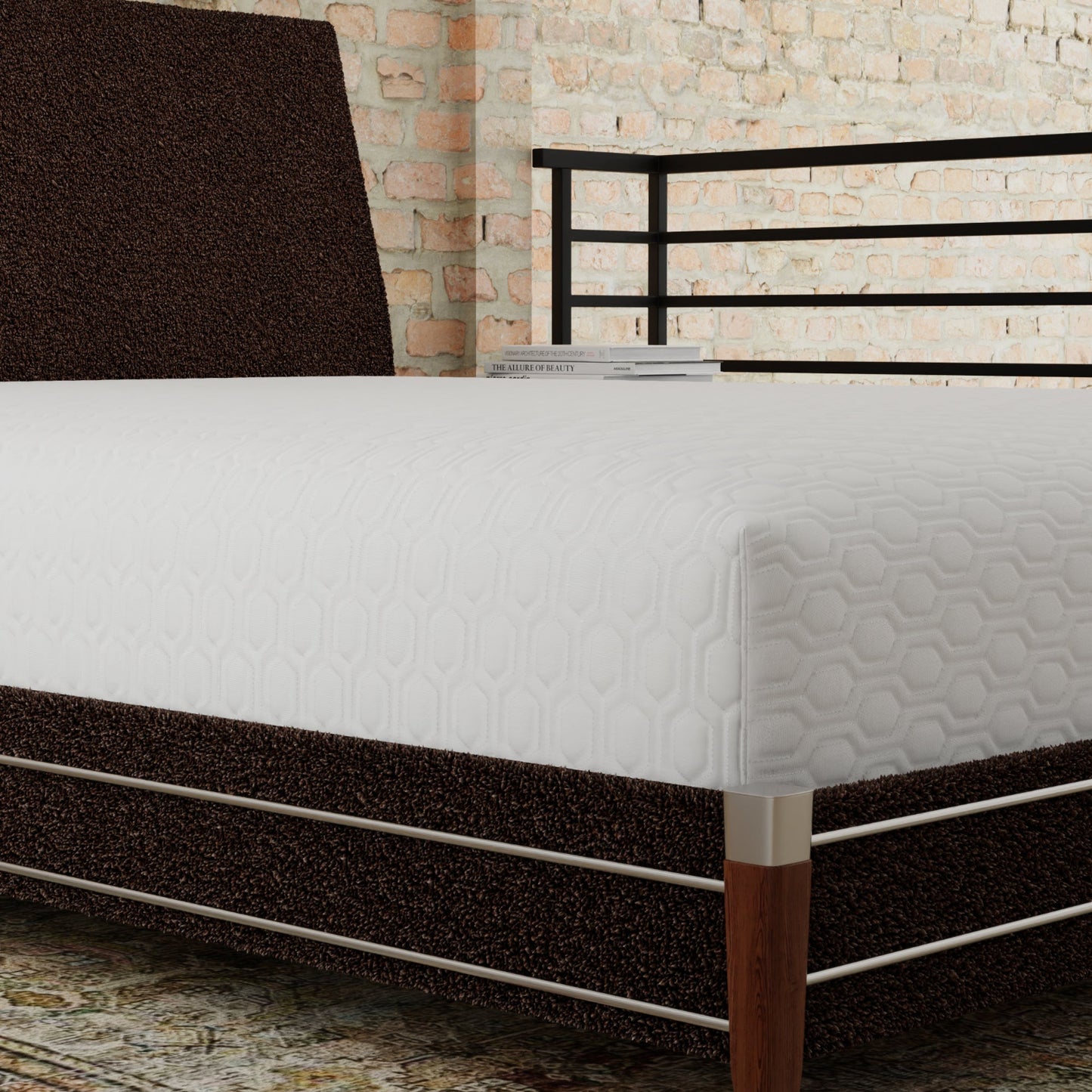 Bed with a white mattress and a dark brown headboard against a stone wall. Mattress is covered with the ICE mattress protector- textured surface and an elongated hexagon pattern