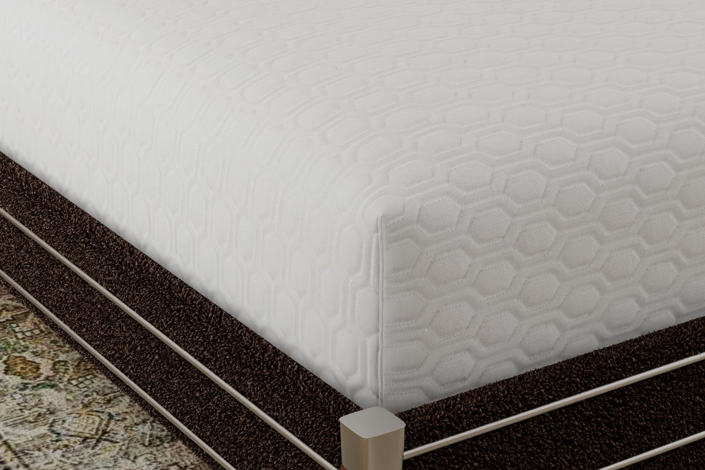 Mattress corner covered with the ICE mattress protector- textured surface and an elongated hexagon pattern