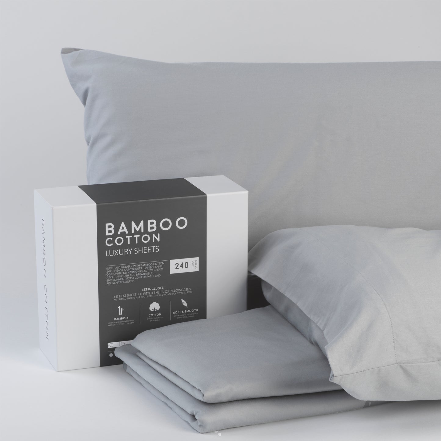 Gray bamboo cotton luxury sheets with packaging on a light gray background