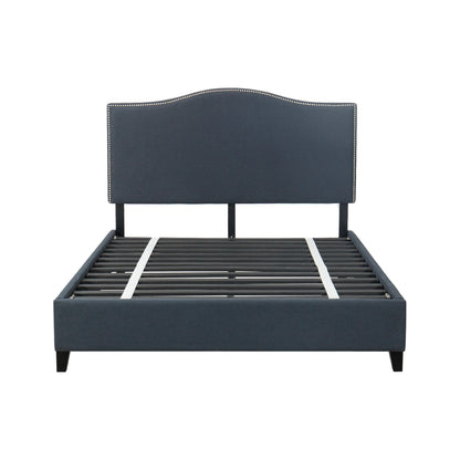 Navy Blue upholstered bed frame with nailhead trim on a white background