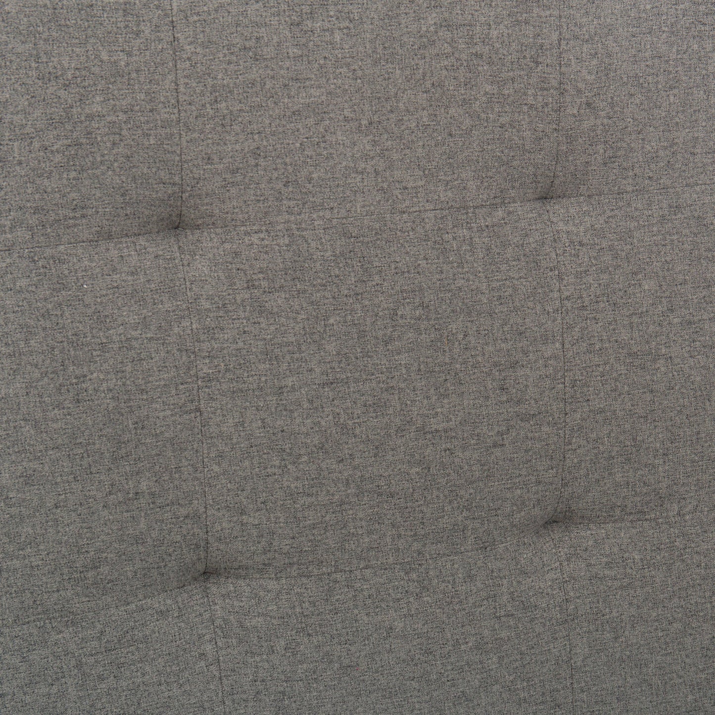 Rowan upholstered bed- close-up of tufted headboard indentations