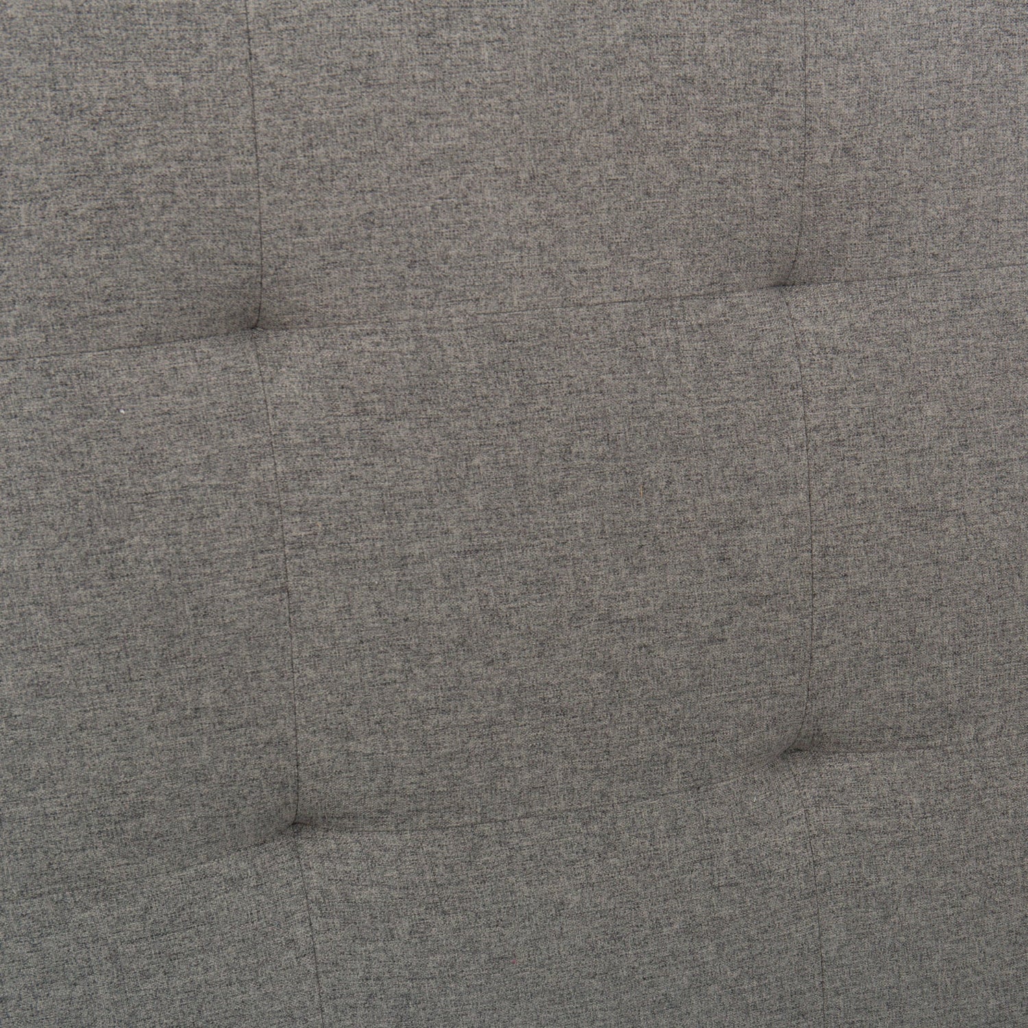 Rowan upholstered bed- close-up of tufted headboard indentations