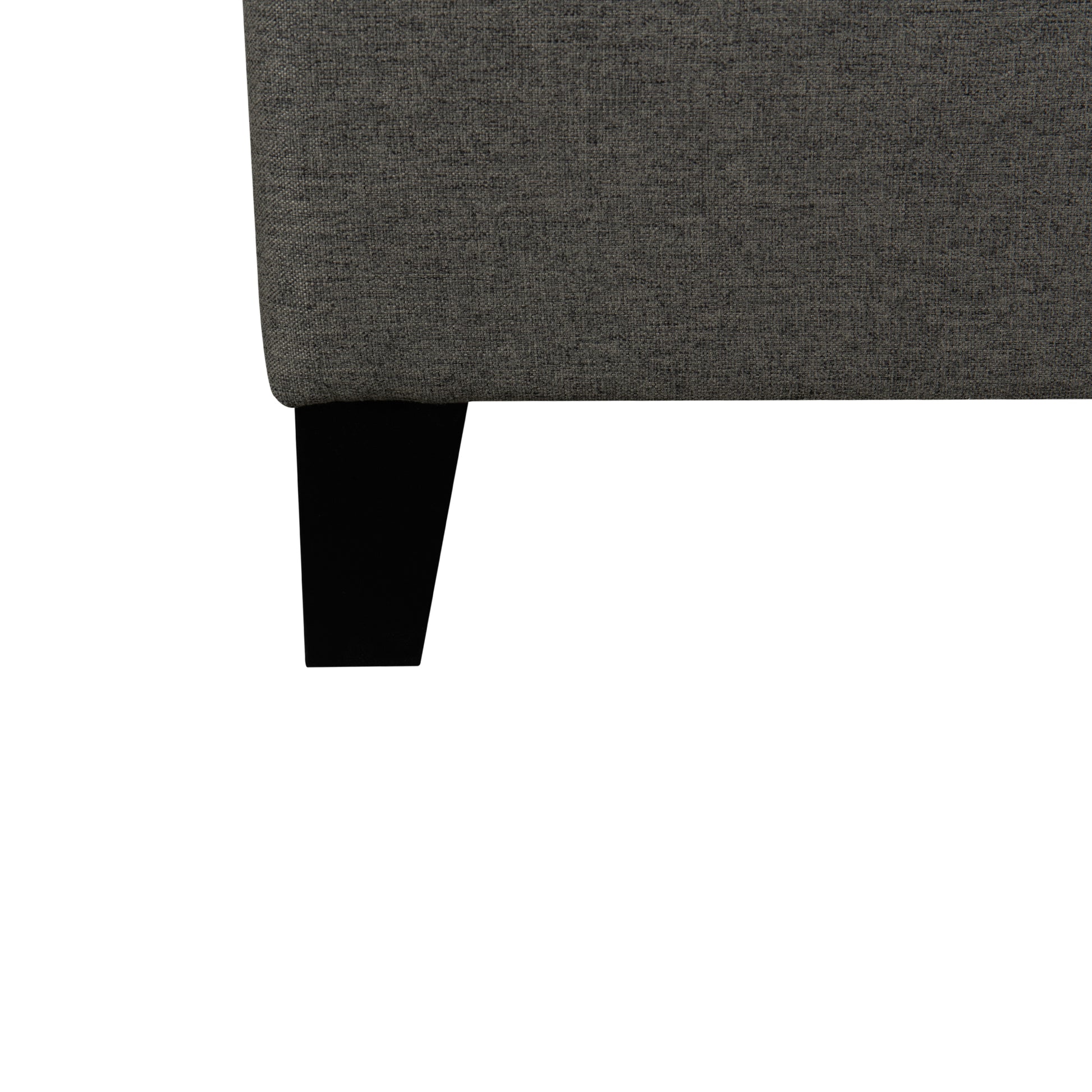 Gray upholstered corner of the Rowan platform bed- black legs on a white background