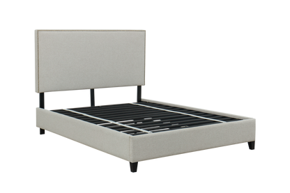 Gray upholstered bed frame on a white background