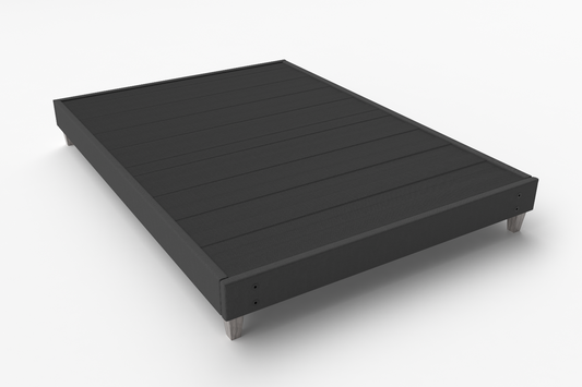 Black upholstered low-profile platform bed / base on a white background