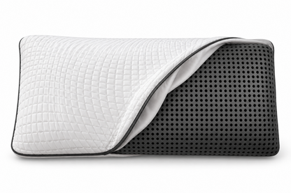 Owen Holmes charcoal memory foam pillow with quilted cover partially removed to reveal the ventilated charcoal foam core.