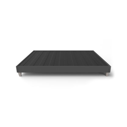 Dark gray upholstered platform bed on a white background