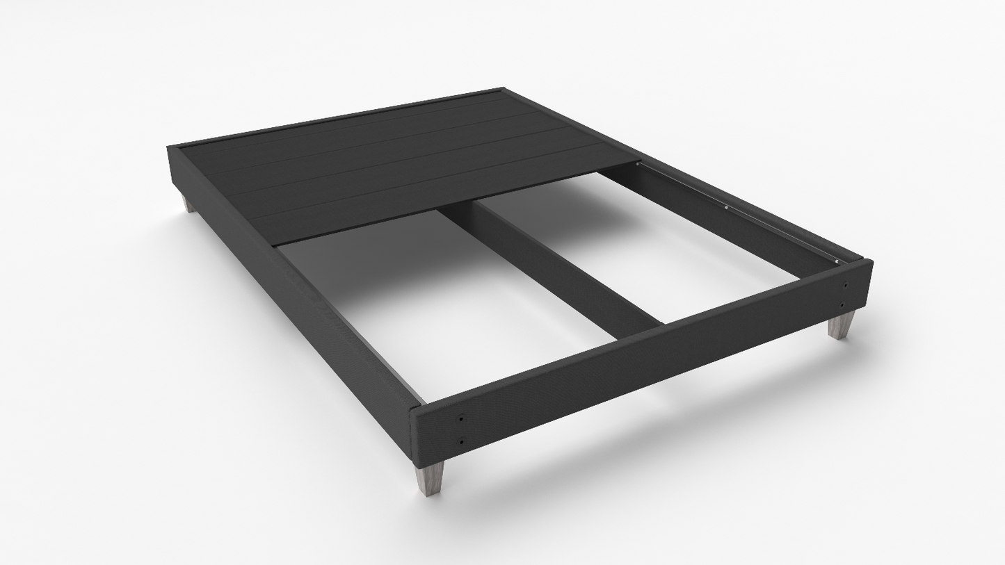 upholstered platform bed frame with slats removed to show space underneath. image is on a white background